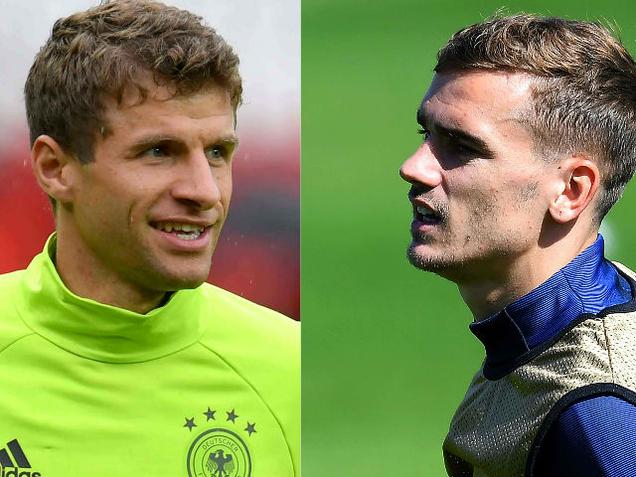 Germany's midfielder Thomas Mueller and France's forward Antoine Griezmann.
France will face Germany in their Euro 2016 Semi Finals football match at the Velodrome stadium in Marseille on July 7 2016