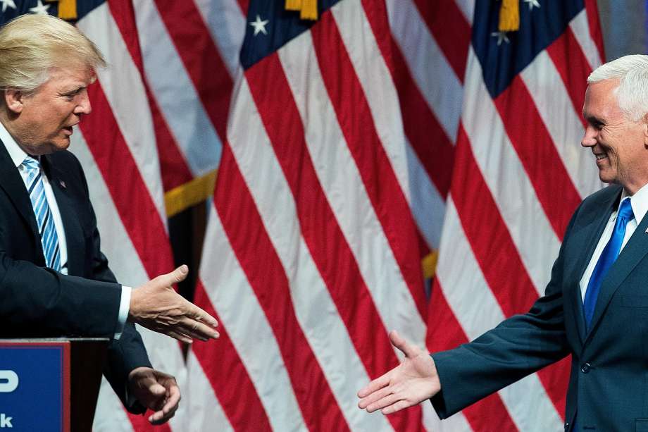 NEW YORK NY- JULY 16  Republican presidential candidate Donald Trump prepares to shake hands with his newly selected vice presidential running mate Mike Pence governor of Indiana during an event at the Hilton Midtown Hotel