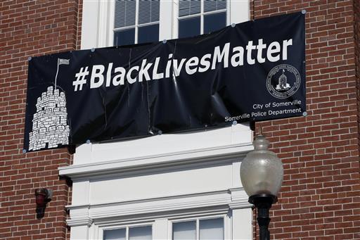 Somerville Mass. Somerville's mayor denied a request from police officers that the banner which has hung for nearly a year be removed and replaced