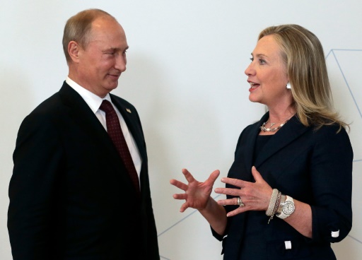 Russian President Vladimir Putin listens to US Secretary of State Hillary Clinton in Russia's far eastern port city Vladivostok in 2012