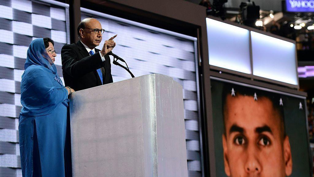 Khizr whose son was killed in Iraq speaks directly to Donald Trump at the Democratic National Convention in Philadelphia on July 28. His wife Ghazala Khan stands beside him