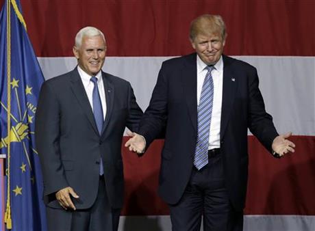 Indiana Gov. Mike Pence joins Republican presidential candidate Donald Trump at a rally in Westfield Ind. Over the past two decades Trump has disagreed with his vice-presidential pick on plenty of political issue