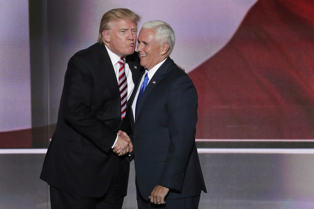 Republican Presidential Candidate Donald Trump give his running mate Republican Vice Presidential Nominee Gov. Mike Pence of Indiana a kiss after Pence's