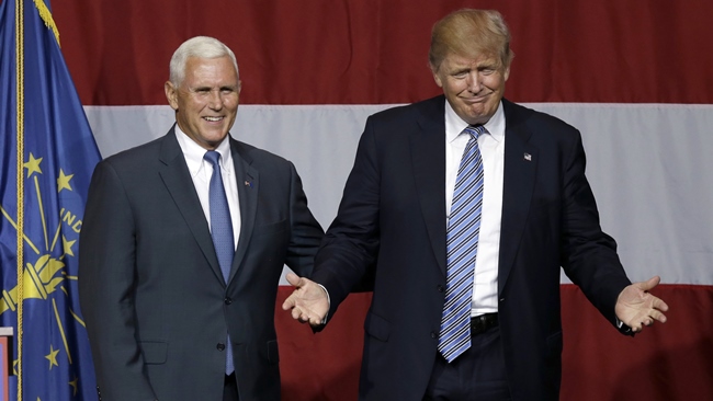 Indiana Gov. Mike Pence joins Republican presidential candidate Donald Trump at a rally in Westfield Ind. Tuesday