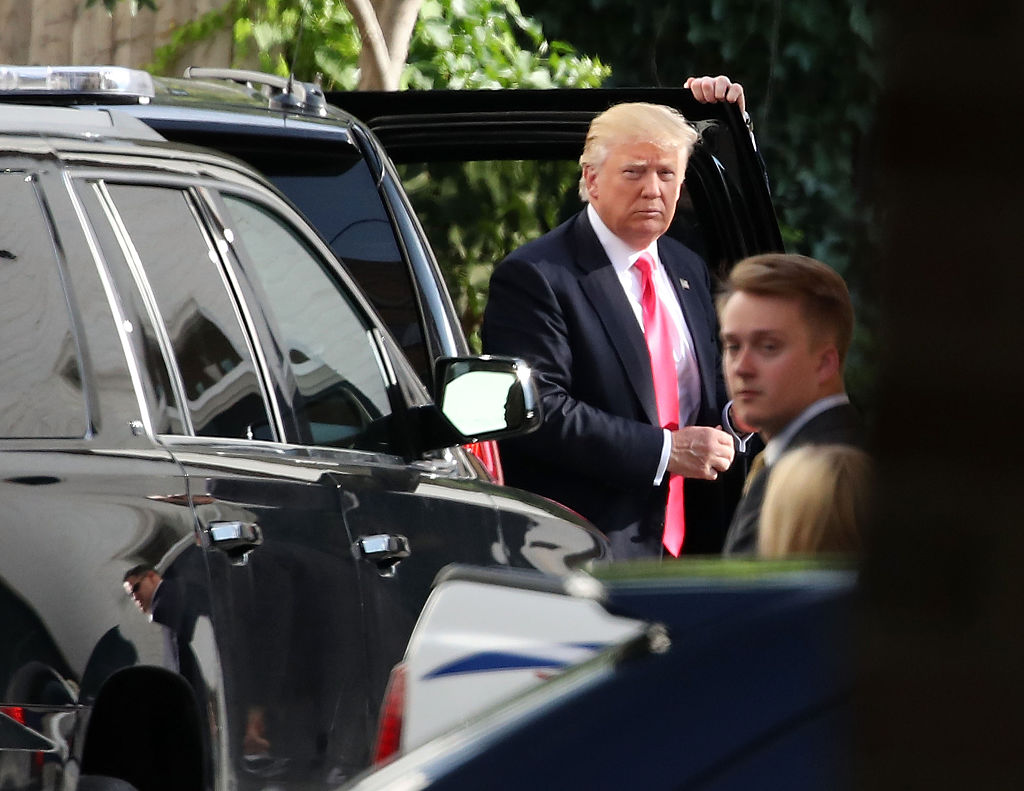 Donald Trump arrives at RNC headquarters for a meeting with House Speaker Paul Ryan, and House Republicans in Washington DC