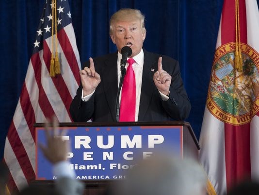 Donald Trump speaks during a news conference at Trump National Doral