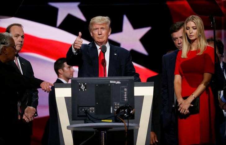 Republican presidential nominee Donald Trump gives a thumbs up as his campaign manager Paul Manafort and daughter Ivanka look on during Trump's walk through at the Republican National Convention in Cleveland U.S