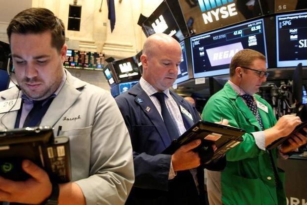 The Dow Jones Industrial Average was up 68.35 points or 0.37% at 18,295.28 and the Nasdaq Composite was up 29.37 points or 0.59% at 5,018.00. Pboto Reuters