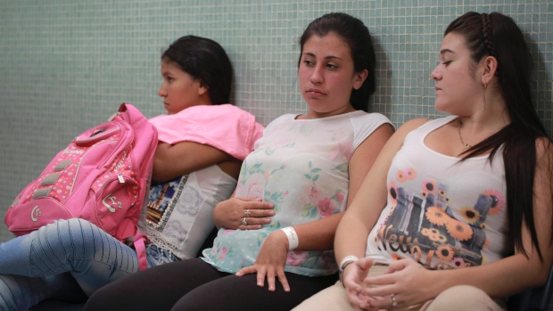 Daniela Rodriguez 19 six-weeks pregnant sits between two other women who are expecting as they wait for test results after being diagnosed with the Zika virus at the Erasmo Meoz Hospital in Cucuta Colombia