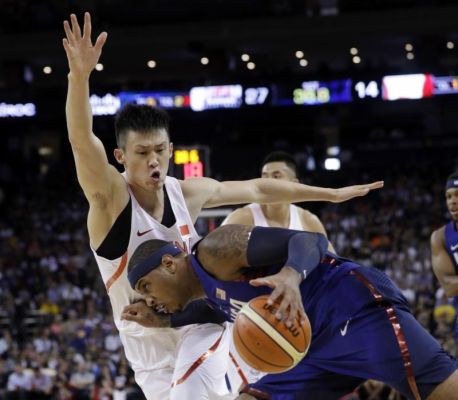 United States Carmelo Anthony drives against China's Zhou