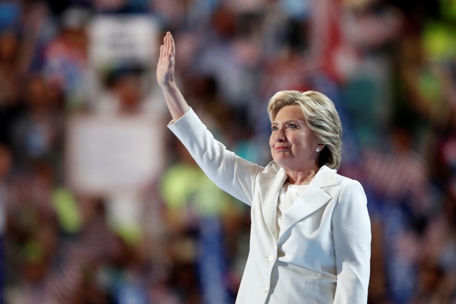 Clinton's pledge: Steady hand at 'moment of reckoning'