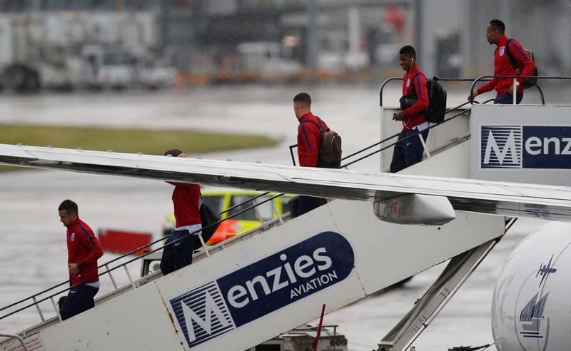 England's Tom Heaton Ross Barkley Marcus Rashford and Nathaniel Clyne arrive back at Manchester Airport