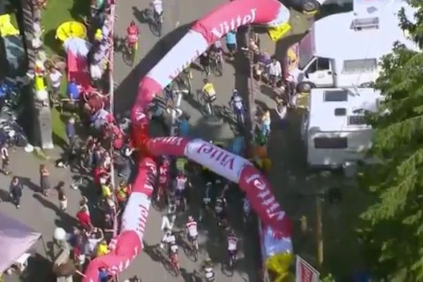 A flamme rouge collapses on the peloton