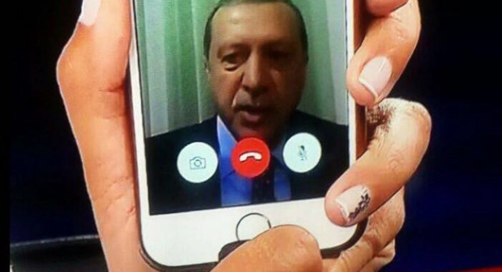 Telephone statement by Turkish President Recep Tayyip Erdogan shown on the news on TV at an Istanbul home