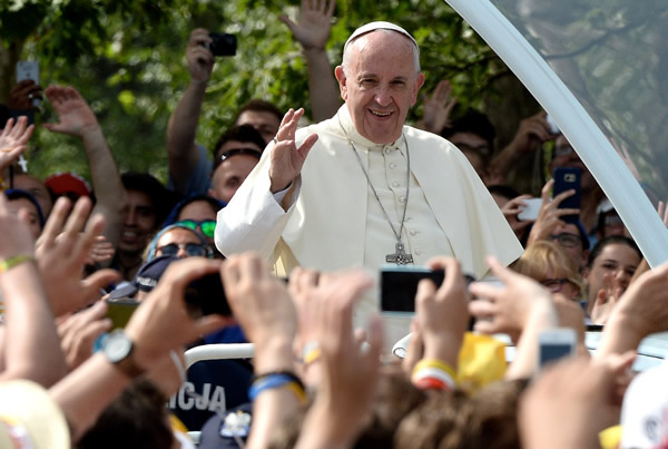 Pope visits sites tied to Polish saints in Krakow