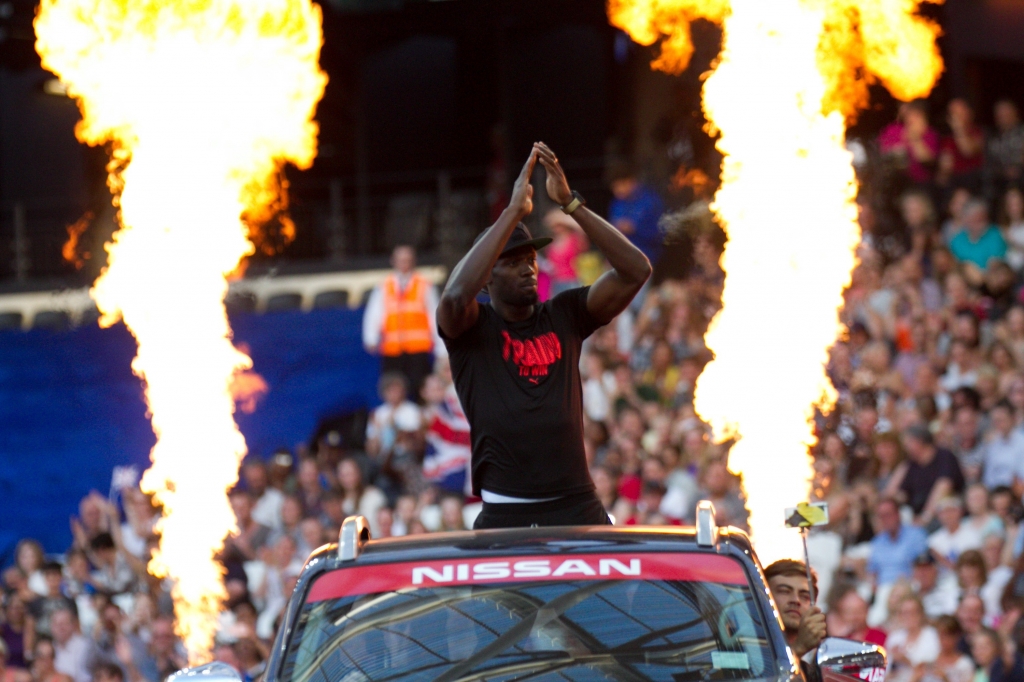 Usain Bolt arrives in style at the Olympic Stadium for the 200m at the Anniversary Games