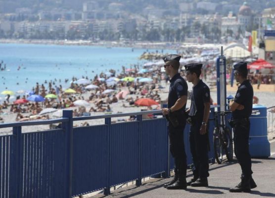 French police officers patrol the Promenade des Anglais