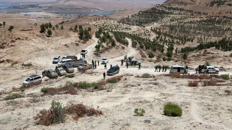 Fighters of Manbij military council and fighters of the Syria Democratic Forces gather in Aleppo Governorate Syria. Rebels launched an attack inside Aleppo early on Monday shelling Syrian government-held areas and clashing with government-allied forces