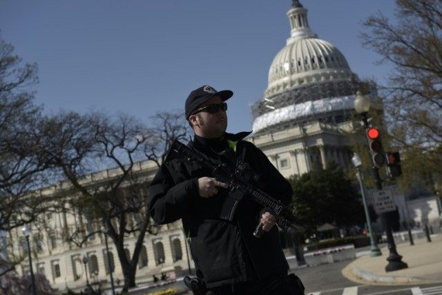 A police officer stands guard at the US Capitol complex in Washington DC