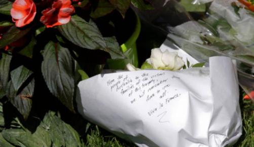 Flowers are placed near the scene of an attack after a truck plowed through a crowd celebrating Bastille Day in Nice