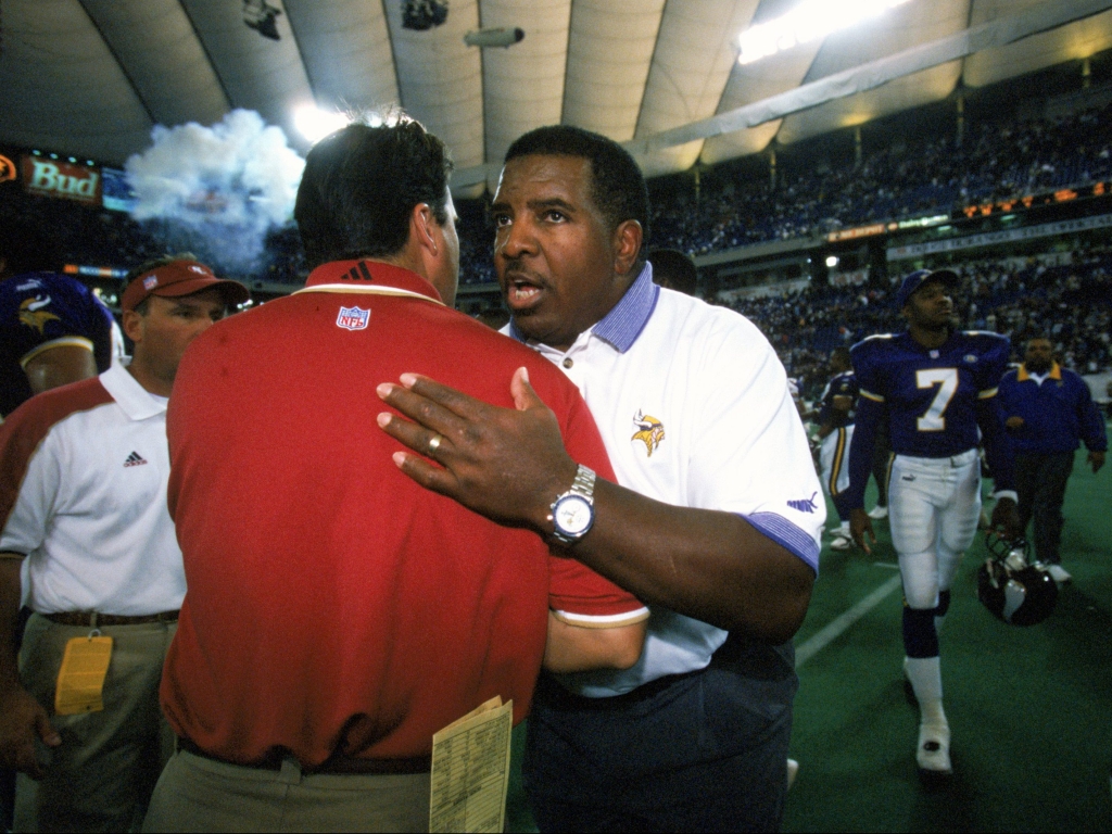 24 Oct 1999 Head Coach Dennis Green of the Minnesota Vikings shakes hands with Head Coach Steve Mariucci of the San Francisco 49ers after the game at the Metrodome in Minneapolis Minnesota. The Vikings defeated the 49ers 40-16. Mandatory Credit Tom Pi