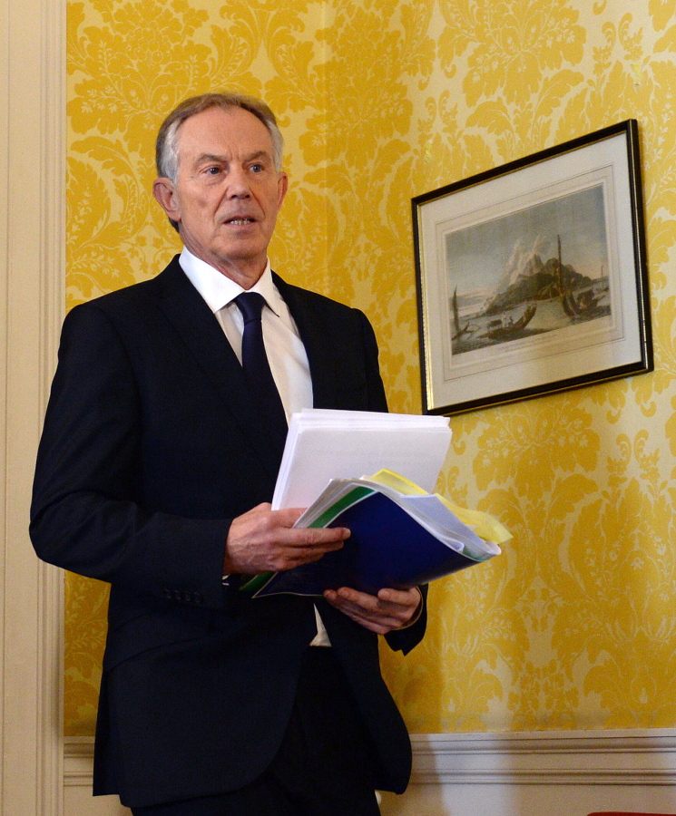 Former Prime Minister Tony Blair arrives for a press conference Wednesday at Admiralty House in London