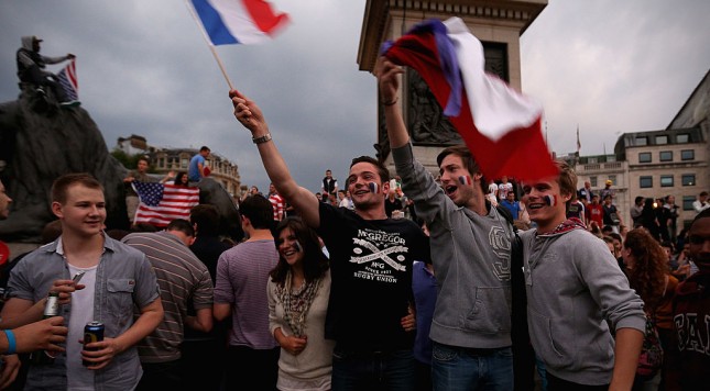 LONDON ENGLAND- JULY 27 France fans celebrate the opening of the London 2012 Olympic Games at Trafalgar Square