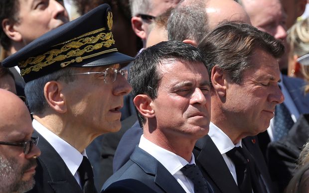 The mayor of Nice Philippe Pradal Prefect of the Alpes Maritimes department Adolphe Colrat French Prime minister Manuel Valls and President of the Provence Alpes Cote d'Azur region Christian Estrosi observe a minute of silence on the Promenade des A