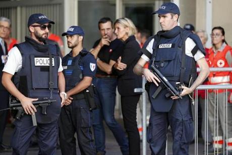 French Police stoodin front of a Chapel of Rest to welcome families of victims three days after a truck mowed through revelers on the famed Promenade des Anglais in Nice southern France Sunday