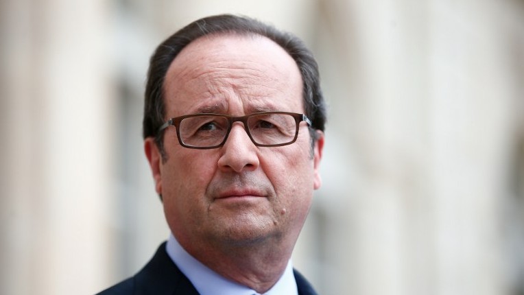 French President Francois Hollande leaves the Elysee Palace in Paris France