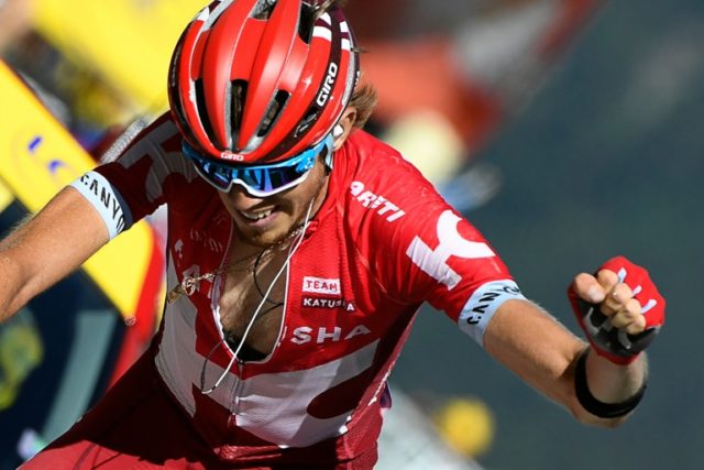 Russia's Ilnur Zakarin celebrates winning the 17th stage of the Tour de France