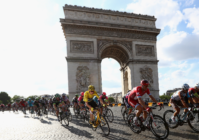 Froome cruises home in the peloton after he built up a lead of more than four minutes over the previous 20 stages