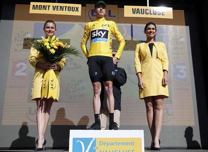 Cycling- The Tour de France cycling race- The 178-km Stage 12 from Montpellier to Chalet Reynard- 14/07/2016- Yellow jersey leader Team Sky rider Chris Froome of Britain reacts on the podium. REUTERS  Juan Medina