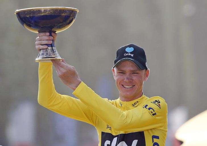 Cycling- Tour de France cycling race- The 113-km Stage 21 from Chantilly to Paris France- 24/07/2016- Yellow jersey leader and overall winner Team Sky rider Chris Froome of Britain reacts on the podium. REUTERS  Juan Medina