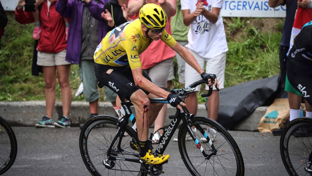 Froome with blood on his right shoulder elbow and knee still extended his lead Kenzo Tribouillard  AFP  Getty Images