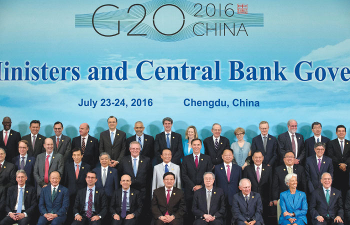 G20 Finance Ministers and Central Bank Governors Britain's Chancellor of the Exchequer Philip Hammond World Bank President Jim Yong Kim an unidentified member Turkey Deputy Prime Minister Mehmet Simsek China's Finance M