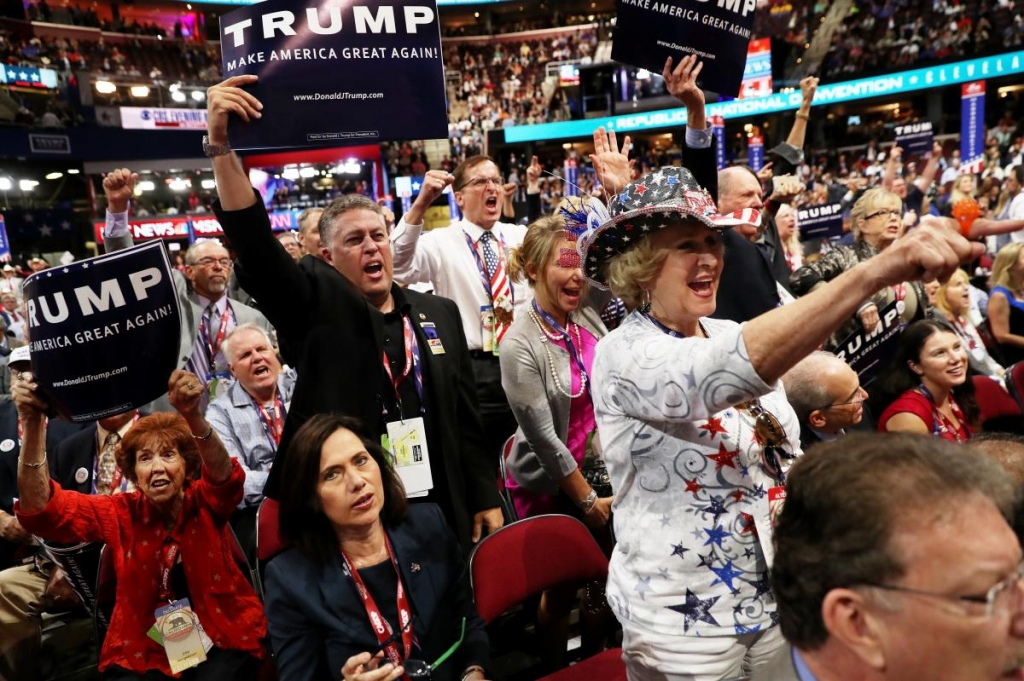 Delegates shout'guilty as New Jersey Governor Chris Christie speaks on the second day of the Republican National Convention on Tuesday at the Quicken Loans Arena in Cleveland