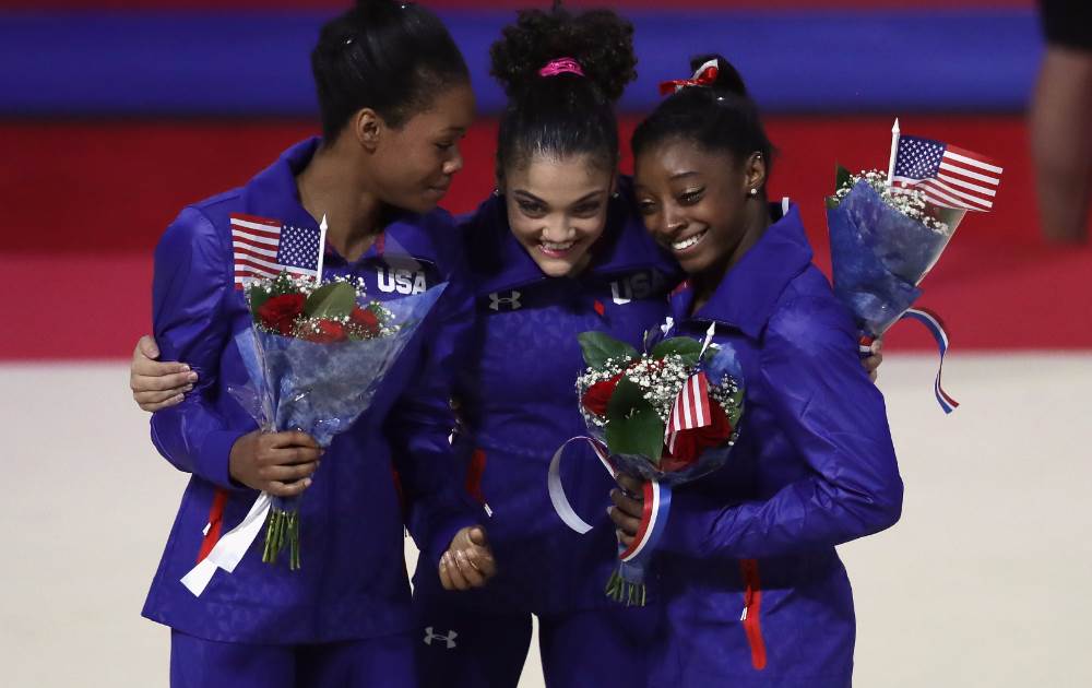 Simone Biles and Gabby Douglas lead USA gymnastics team for Rio