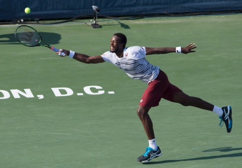 Gael Monfils goes full extension to return an Ivo Karlovic serve during Sunday’s Citi Open final