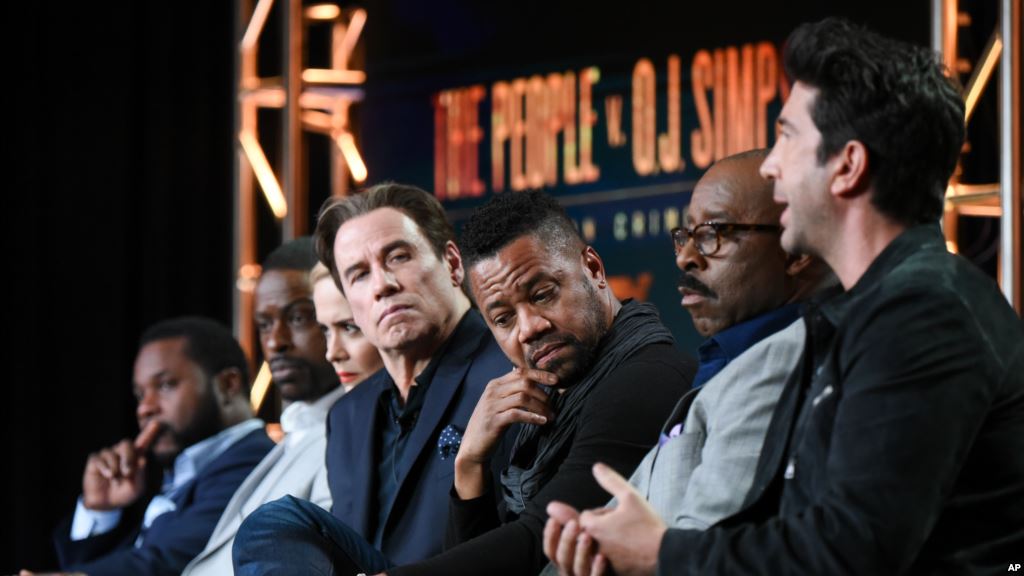 FILE- Actors Malcolm Jamal Warner from left Sterling K. Brown Sarah Paulson John Travolta Cuba Gooding Jr. Courtney B. Vance and David Schwinner participate in'The People v. O.J. Simpson panel Jan. 16 2016