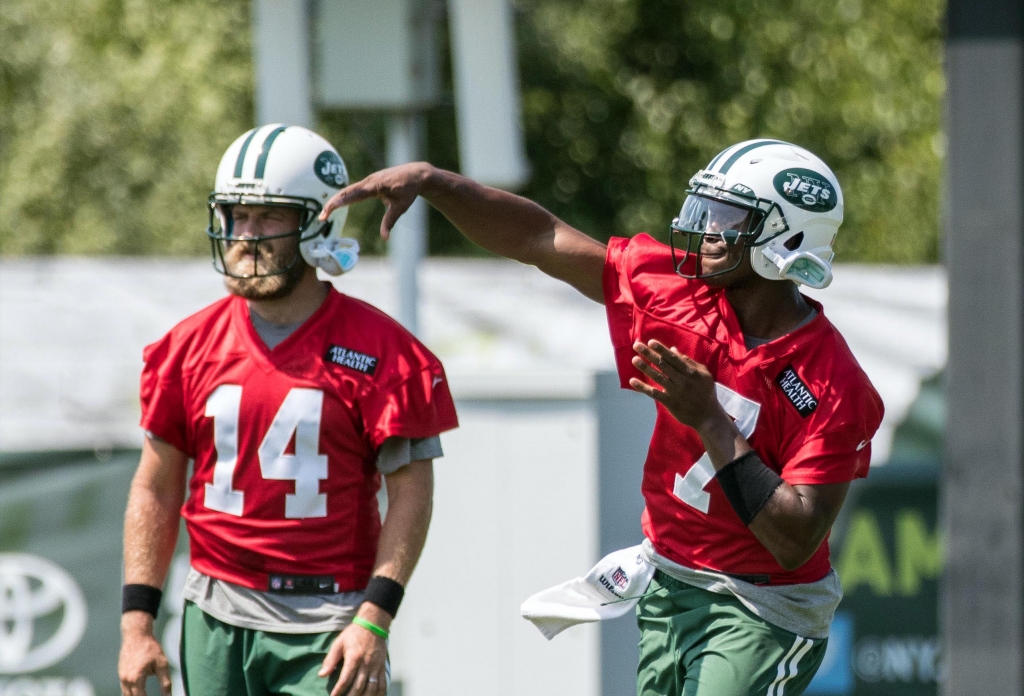 Jul 28 2016 Florham Park NJ USA New York Jets quarterback Geno Smith passes in front of quarterback Ryan Fitzpatrick during training camp at Atlantic Health Jets Training Center. Mandatory Credit Vincent Carchietta-USA TODAY Sports