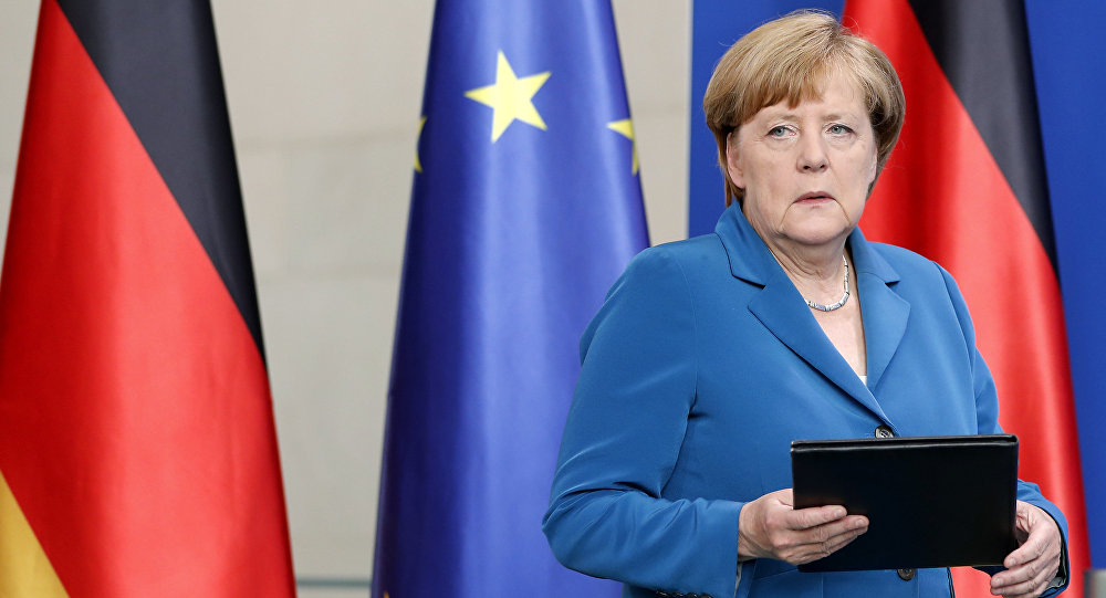 German Chancellor Angela Merkel arrives for a statement in Berlin Germany Saturday