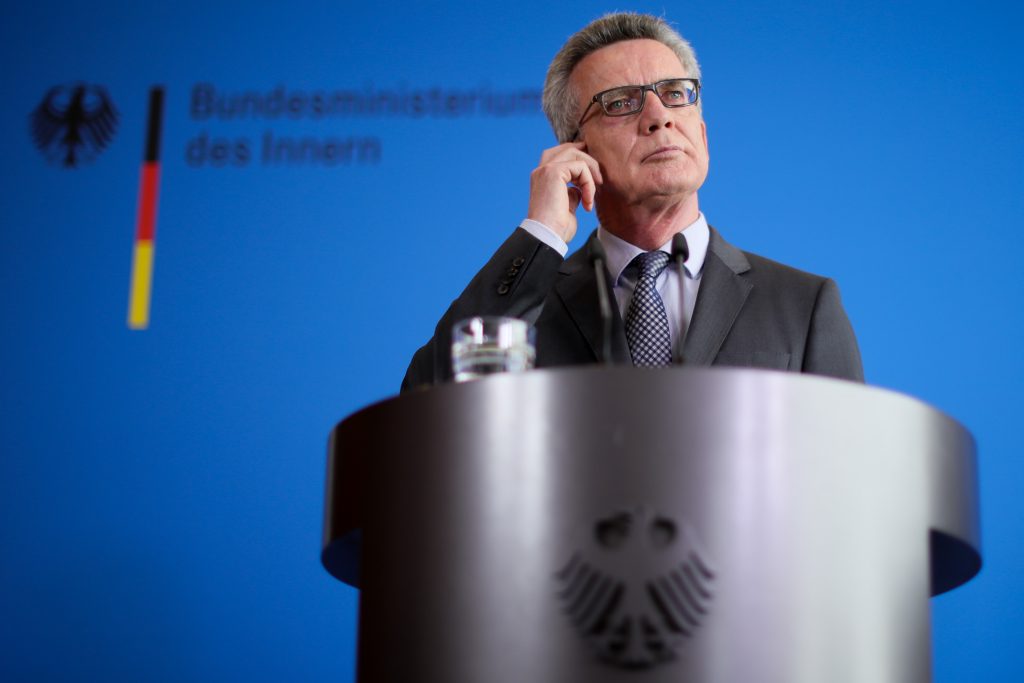 German Interior Minister Thomas de Maiziere gives a press conference on the attack. Tobias Schwarz—AFP