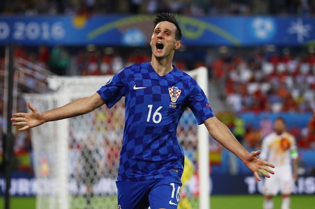 Nikola Kalinic of Croatia celebrates scoring his team's first goal