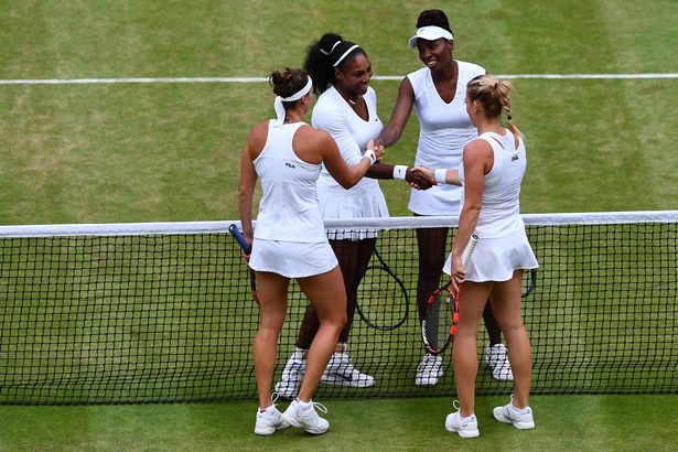 Getty
The two couples enjoyed a warm embrace at the end of the match