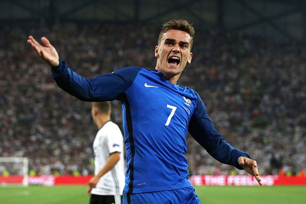 Antoine Griezmann of France celebrates after scoring the opening goal from the penalty spot