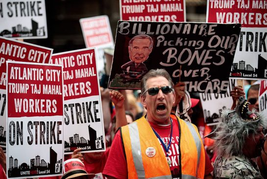 Striking casino workers and other activists protest outside the Trump Taj Mahal owner Carl Icahn's office in New York City. Icahn one of the world's richest people is a key supporter of Donald Trump's campaign