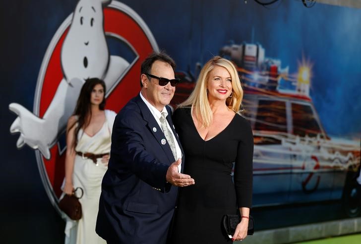 Executive producer Dan Aykroyd and his wife Donna pose at the premiere of the film'Ghostbusters in Hollywood California U.S