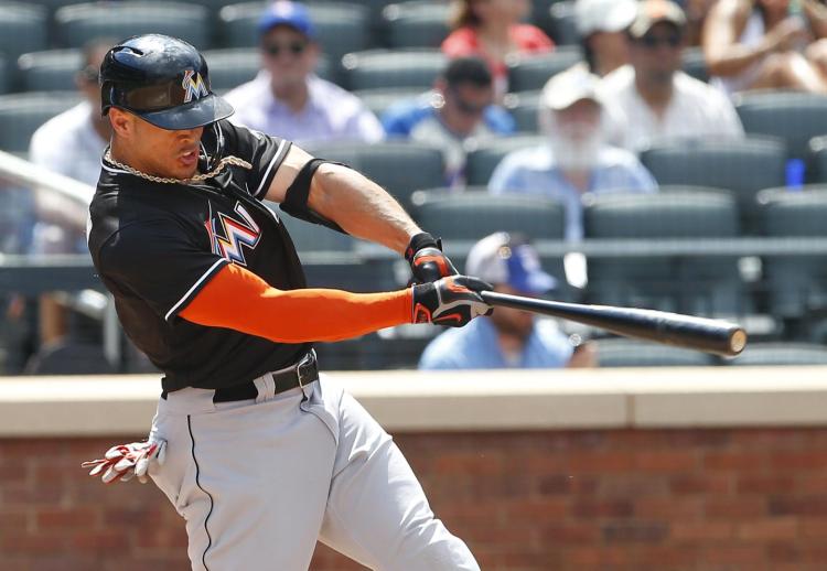 Giancarlo Stanton blasts two more home runs but the Mets are able to hang on for a 4-2 win