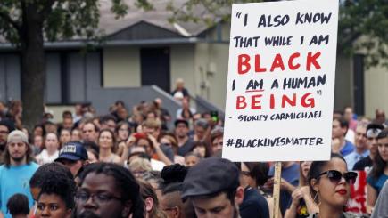 Hundreds gather for a vigil following the shooting of Philando Castile